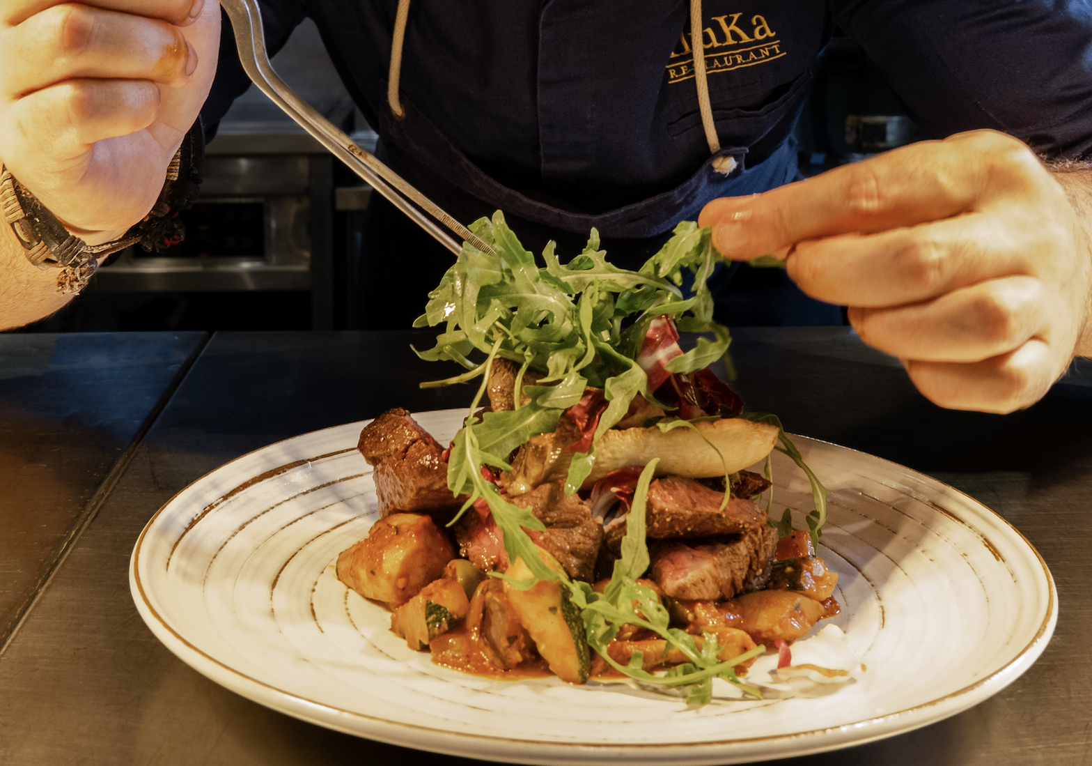 Fine dining steak with sauce and grilled vegetables at Iluka Restaurant Jeonju