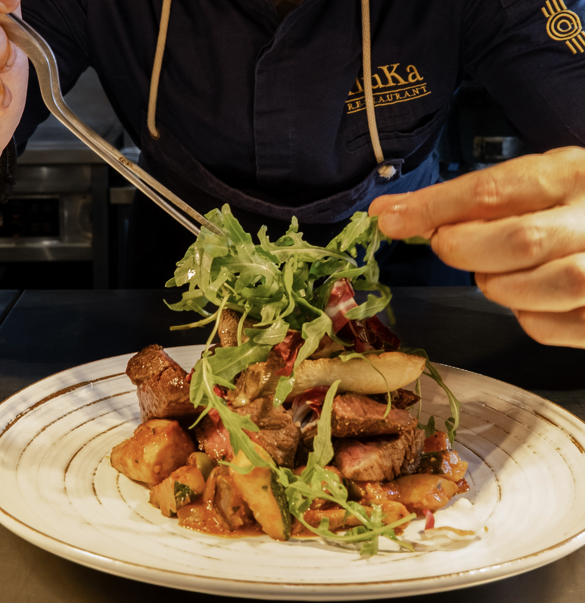 Fine dining steak with sauce and grilled vegetables at Iluka Restaurant Jeonju